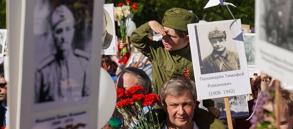 Акция Бессмертный полк в Риге Акция Бессмертный полк в Риге - Sputnik Latvija