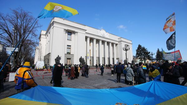 Участники акции у здания Верховной Рады в Киеве. 22 марта 2018 г. - Sputnik Латвия