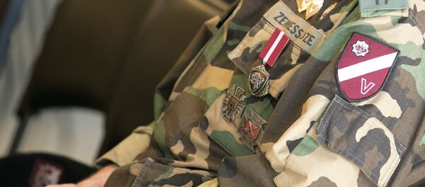 Zemessardzes uzšuve. Foto no arhīva Zemessardzes uzšuve. Foto no arhīva - Sputnik Latvija