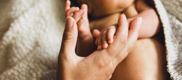 Jaundzimušais ar mati. Foto no arhīva - Sputnik Latvija