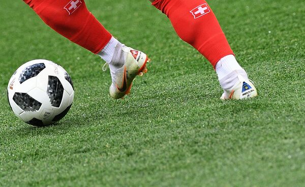 Бутсы Джердана Шакири (Швейцария) на разминке перед матчем группового этапа ЧМ по футболу между сборными Швейцарии и Коста-Рики - Sputnik Латвия