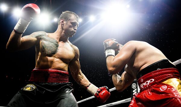 Майрис Бриедис (Латвия) (слева) и Брандон Делорье (Франция) (справа) - Sputnik Латвия