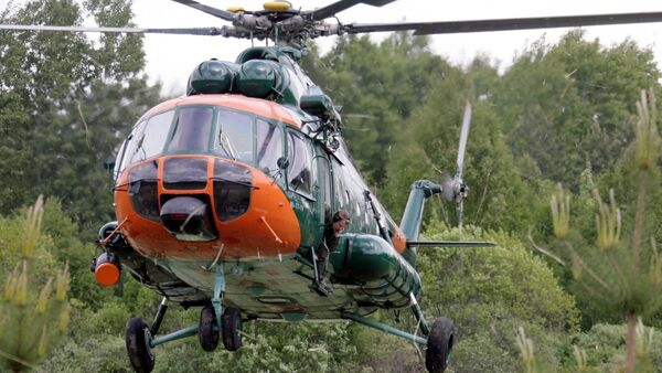 Вертолет НВС Латвии участвует в тушении пожара под Талси - Sputnik Латвия