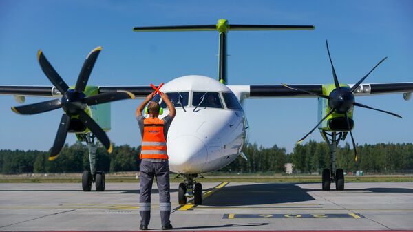 Самолет Bombardier Q400 NextGen авиакомпании airBaltic в аэропорту Рига - Sputnik Латвия