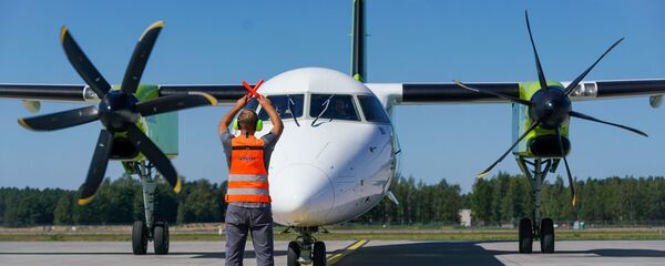 Самолет Bombardier Q400 NextGen авиакомпании airBaltic в аэропорту Рига - Sputnik Латвия