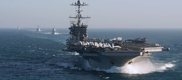 Ударная группа ВМС США во главе с авианосцем Harry Truman покинула порт Норфолк Ударная группа ВМС США во главе с авианосцем Harry Truman покинула порт Норфолк - Sputnik Latvija