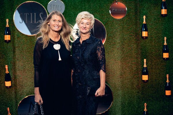 Мероприятие посетили известные женщины Латвии, включая хозяйку арт-галереи Putti Агиту Путане и первую леди страны Ивету Вейоне - Sputnik Латвия