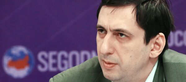 Эксперт Института востоковедения РАН Андрей Арешев во время видеомоста Москва - Ереван - Sputnik Латвия