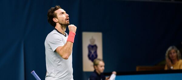 Латвийский теннисист Эрнестс Гулбис на чемпионате Stockholm Open 2018. 20 октября 2018 г. - Sputnik Латвия