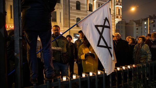 Шествие Памяти в Риге в преддверии Международного Дня против фашизма, расизма и антисемитизма - Sputnik Латвия